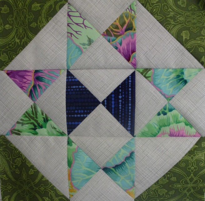 The Star Block, one of favourite blocks in the quilt with it's clear value differences and Kaffe cabbages.